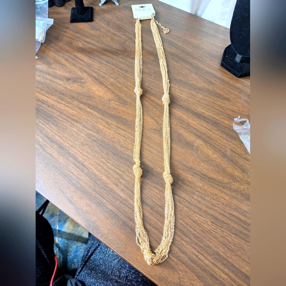 Erica Lyons gold knotted sweater necklace